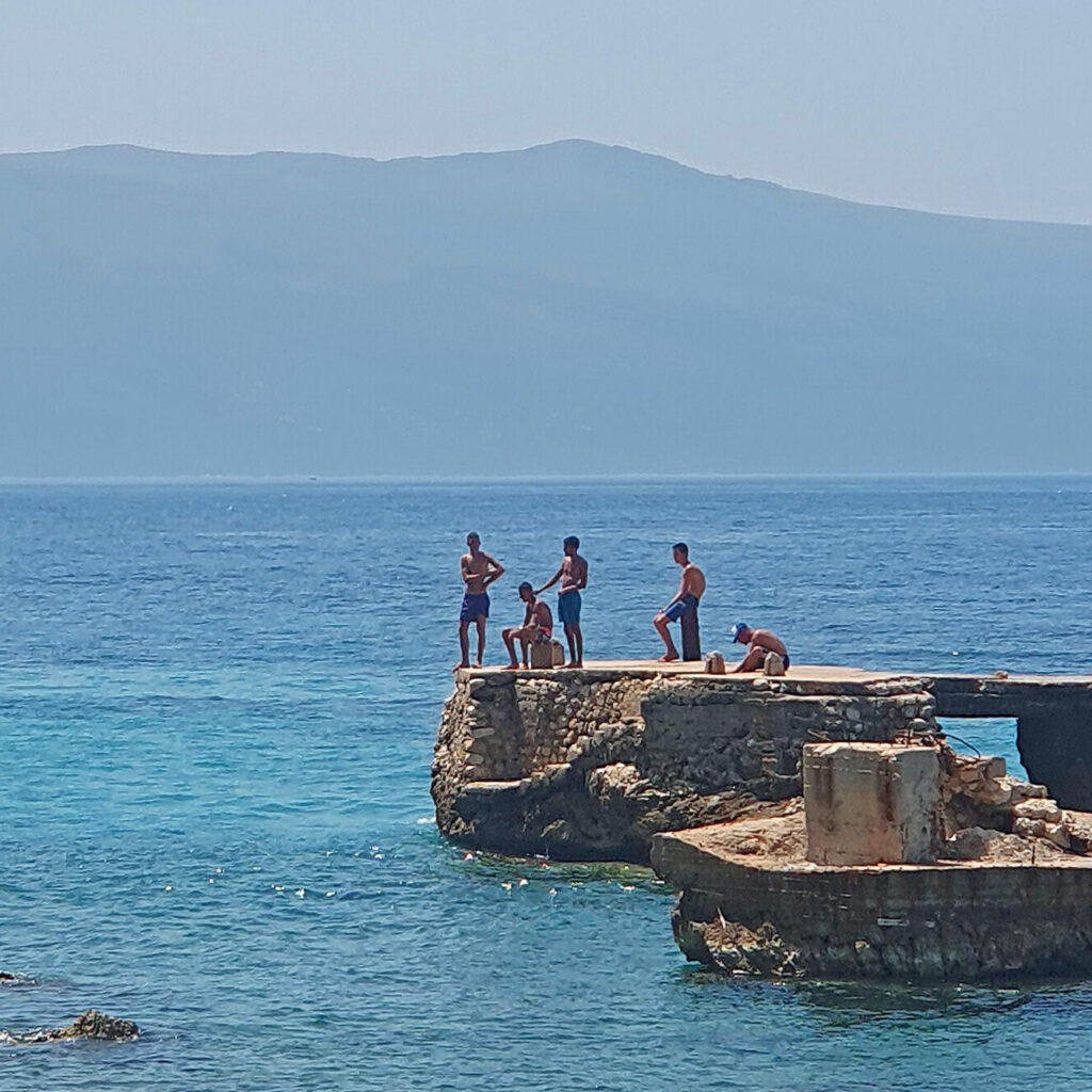 Locals in Vlore, Albania enjoying an afternoon swim in the sun