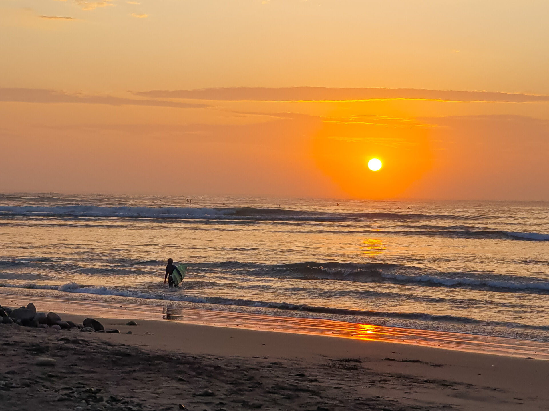 huanchaco traditional surfer sunset - traveloffscript